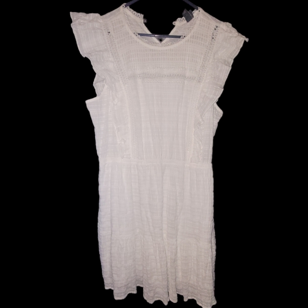 White dress with ruffle sleeves